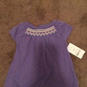 Carter’s Two piece onesie and shirt set.